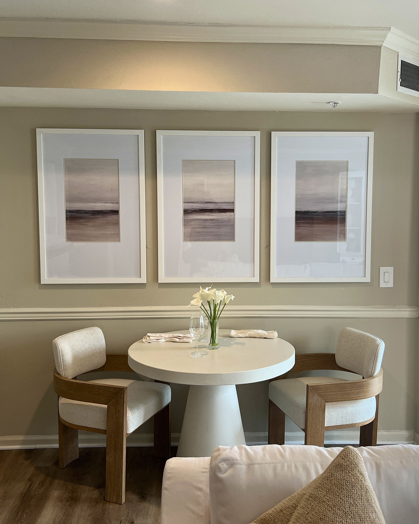 Ave-Malvern-Apartment-Model-Room-framed-triptych-dining-vertical