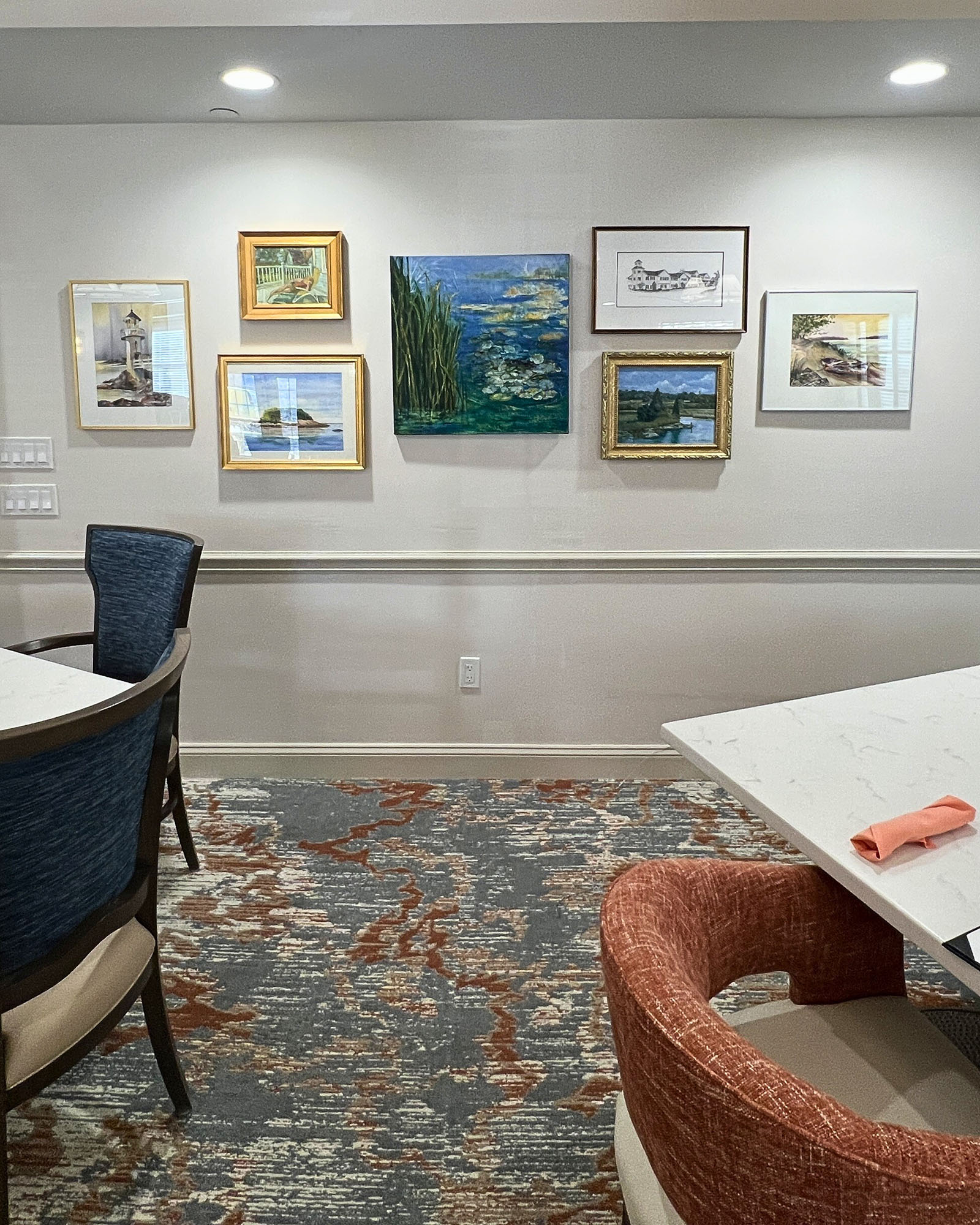 Harbor-Chase-of-Madison-Dining-room-art-installation-Senior-Living-1-Vertical